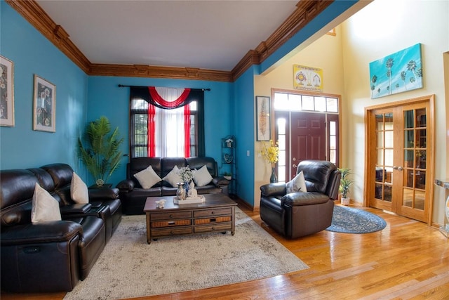 6020 Pebble Creek Dr, Fairview, PA 16415 - living room featuring french doors, crown molding, and wood finished floors
