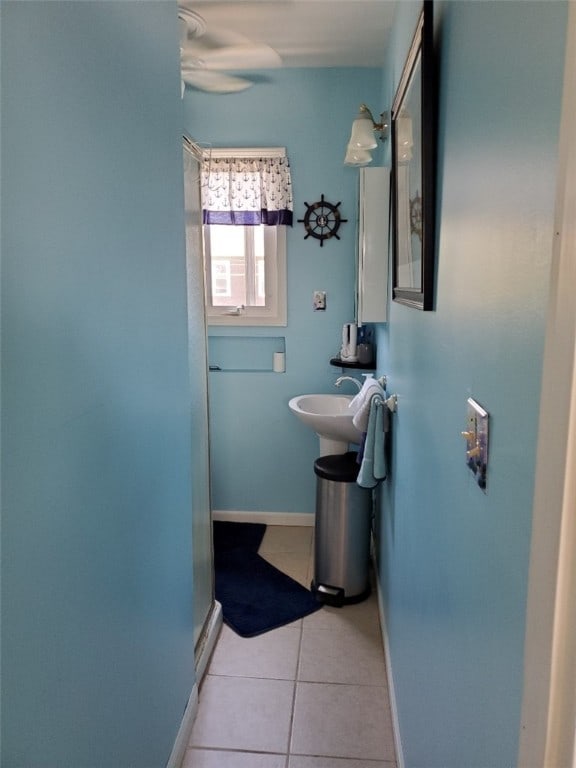 bathroom with tile patterned flooring