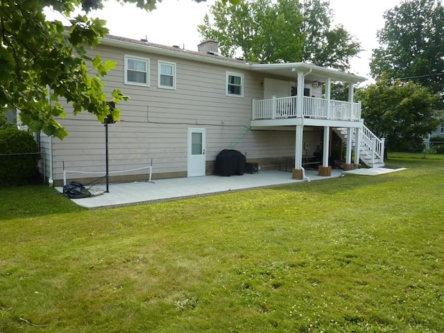 3404 Rustic Ln, Erie, PA 16506 - rear view of property featuring stairway, a patio, a lawn, and a deck