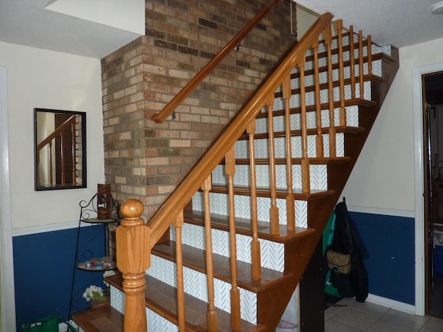 3404 Rustic Ln, Erie, PA 16506 - staircase featuring tile patterned flooring and baseboards