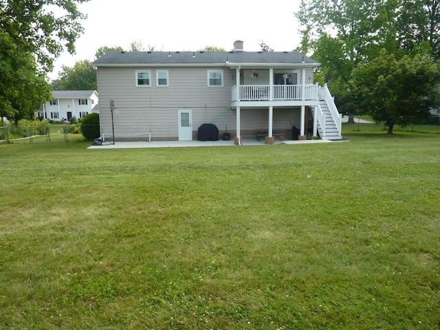 3404 Rustic Ln, Erie, PA 16506 - back of house featuring a patio, stairway, a wooden deck, and a chimney