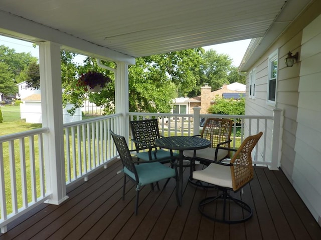 3404 Rustic Ln, Erie, PA 16506 - wooden deck featuring a lawn and outdoor dining area