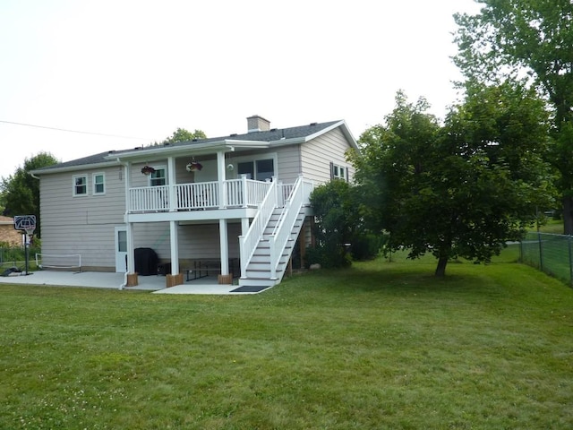 3404 Rustic Ln, Erie, PA 16506 - back of property featuring a patio area, stairway, and a wooden deck