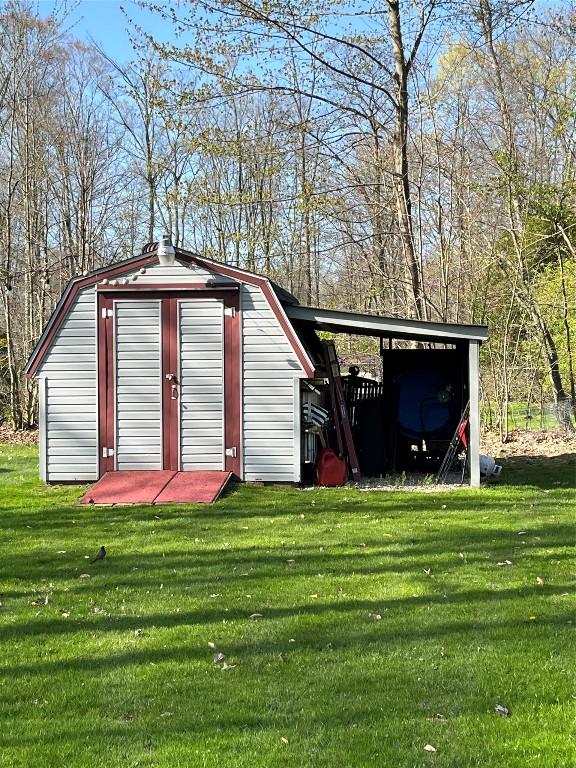 view of shed with a carport