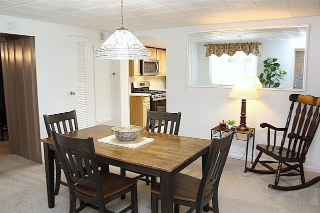 6361 Cherry Ext, Erie, PA 16509 - dining area with light colored carpet and arched walkways
