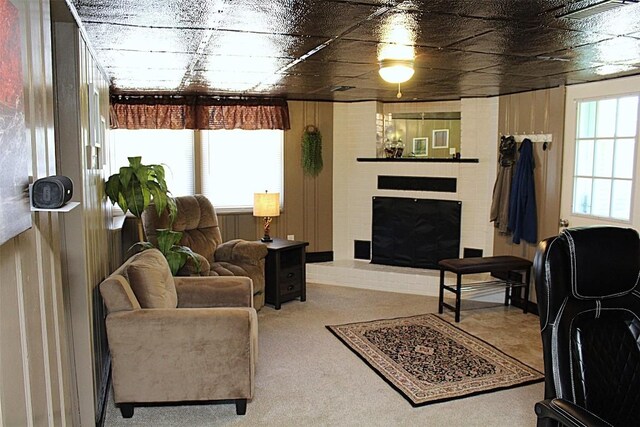6361 Cherry Ext, Erie, PA 16509 - carpeted living area featuring a fireplace with raised hearth