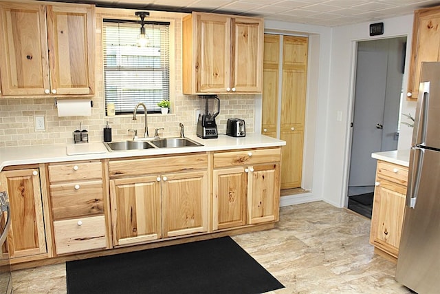 6361 Cherry Ext, Erie, PA 16509 - kitchen with light brown cabinets, tasteful backsplash, and freestanding refrigerator
