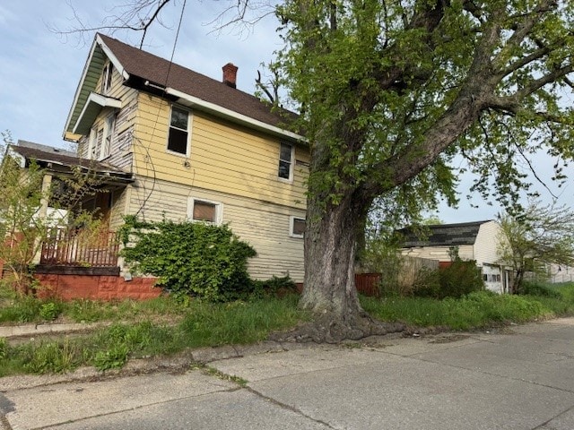 1201 E 21st St, Erie, PA 16503 - view of property exterior featuring a chimney