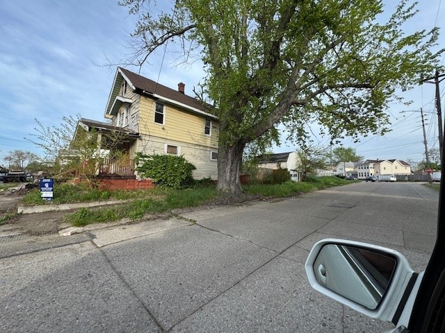 1201 E 21st St, Erie, PA 16503 - view of side of home with a chimney