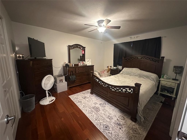 bedroom with a ceiling fan and wood finished floors