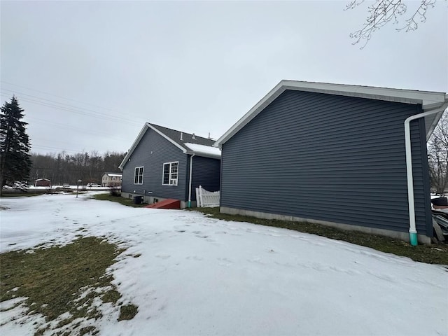 view of snow covered property