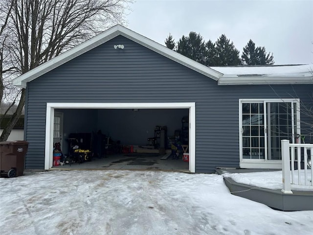 view of snow covered garage