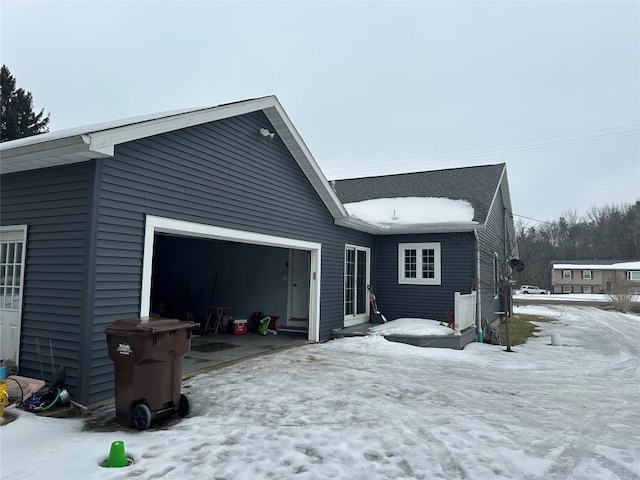 exterior space featuring an attached garage