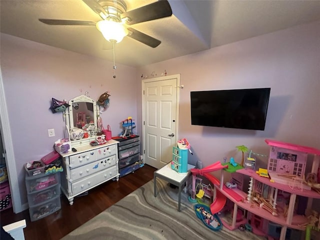 game room with wood finished floors and a ceiling fan