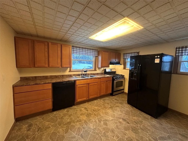 kitchen with sink and black appliances