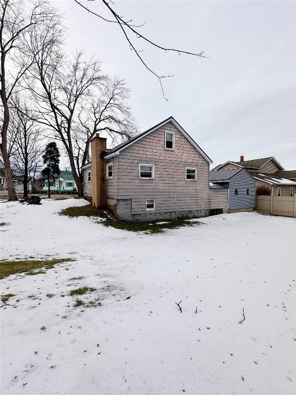 view of snow covered house