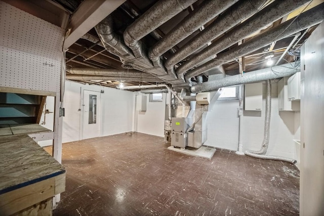 basement featuring heating unit