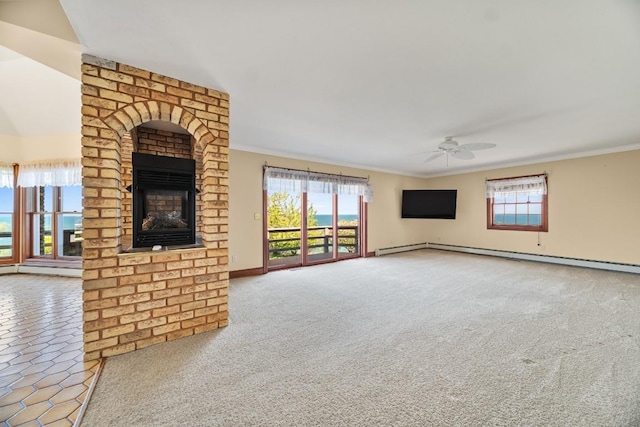 100 Fox Hollow Ln, Harborcreek, PA 16511 - unfurnished living room with a ceiling fan, crown molding, healthy amount of natural light, a fireplace, and baseboards