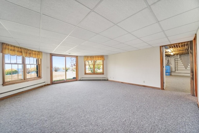 100 Fox Hollow Ln, Harborcreek, PA 16511 - carpeted spare room featuring a paneled ceiling, baseboards, and a baseboard radiator