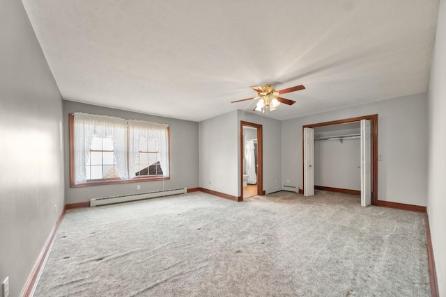 100 Fox Hollow Ln, Harborcreek, PA 16511 - unfurnished bedroom featuring a baseboard heating unit, carpet floors, and baseboards