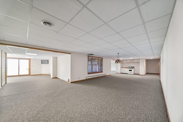 100 Fox Hollow Ln, Harborcreek, PA 16511 - carpeted empty room with a baseboard heating unit, baseboards, and a paneled ceiling