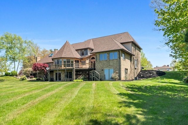 100 Fox Hollow Ln, Harborcreek, PA 16511 - back of property featuring stairway, a yard, and a deck
