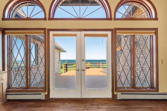 100 Fox Hollow Ln, Harborcreek, PA 16511 - doorway to outside with baseboard heating, a water view, french doors, and wood finished floors