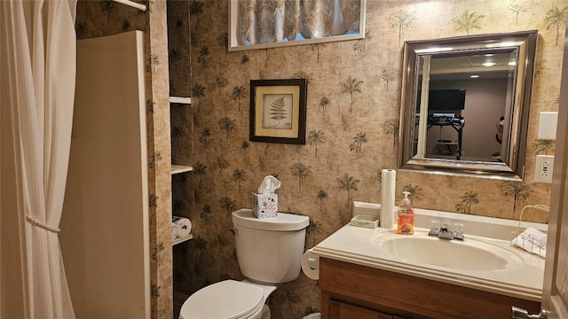 6007 Marble Ln, Fairview, PA 16415 - bathroom with vanity, toilet, and wallpapered walls