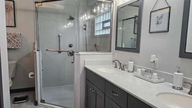 6007 Marble Ln, Fairview, PA 16415 - full bathroom with a shower stall, toilet, and double vanity