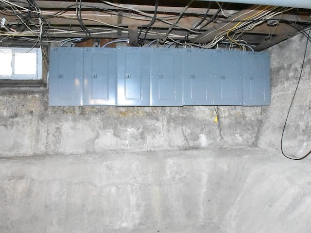 basement featuring electric panel