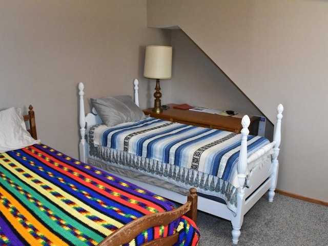 carpeted bedroom with baseboards