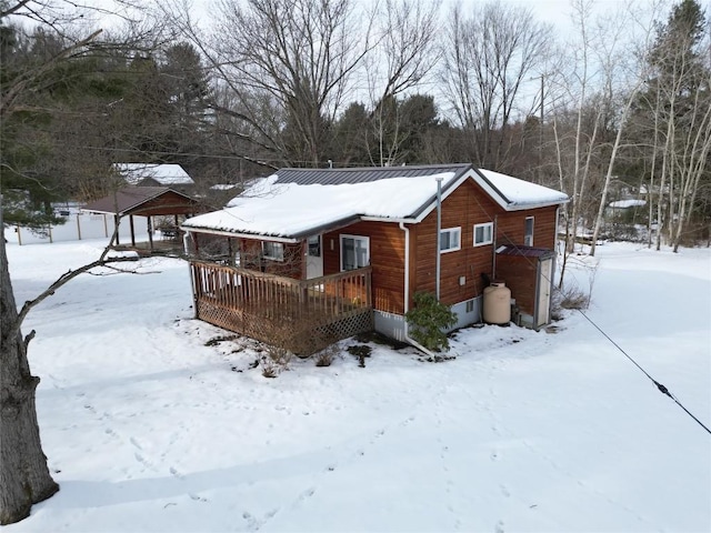 exterior space featuring a wooden deck