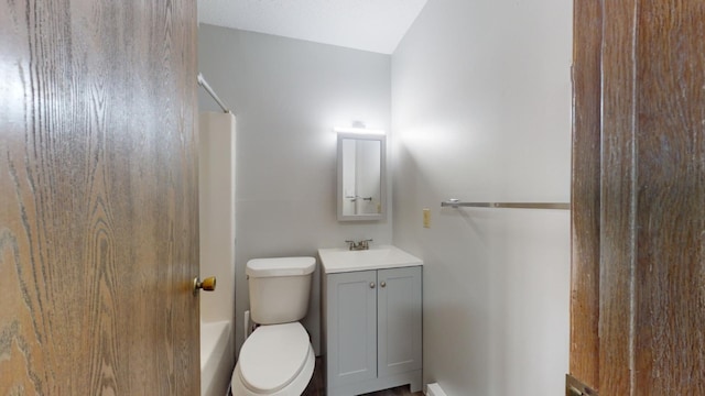 full bathroom with vanity, shower / bathing tub combination, and toilet