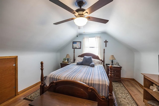 2514 E 43rd St, Erie, PA 16510 - bedroom with wood finished floors, vaulted ceiling, a ceiling fan, and baseboards