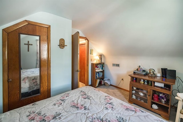 2514 E 43rd St, Erie, PA 16510 - carpeted bedroom with vaulted ceiling and baseboards