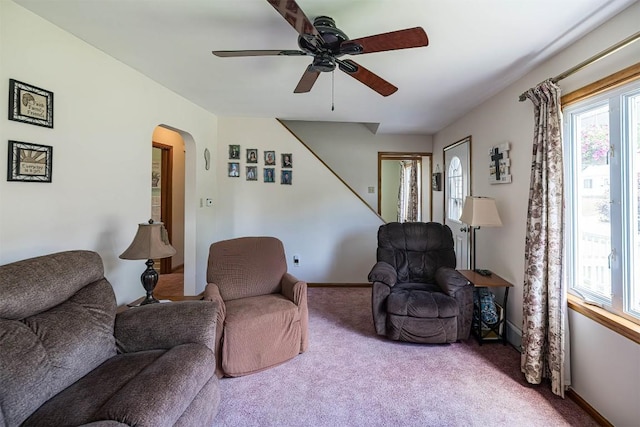 2514 E 43rd St, Erie, PA 16510 - carpeted living area with a ceiling fan, arched walkways, and baseboards