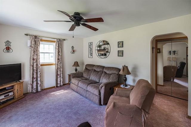 2514 E 43rd St, Erie, PA 16510 - carpeted living room featuring a ceiling fan, arched walkways, and baseboards