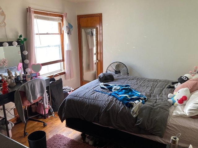 bedroom with light hardwood / wood-style floors