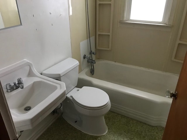 full bathroom featuring shower / bathing tub combination, toilet, and sink