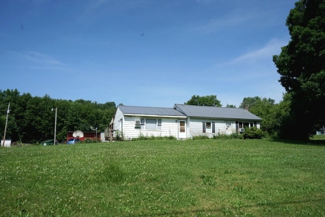 17315 Phelps Rd, Linesville, PA 16424 - view of front of home with a front lawn and a metal roof