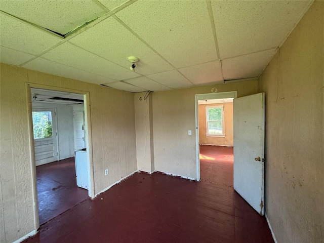 empty room with a paneled ceiling