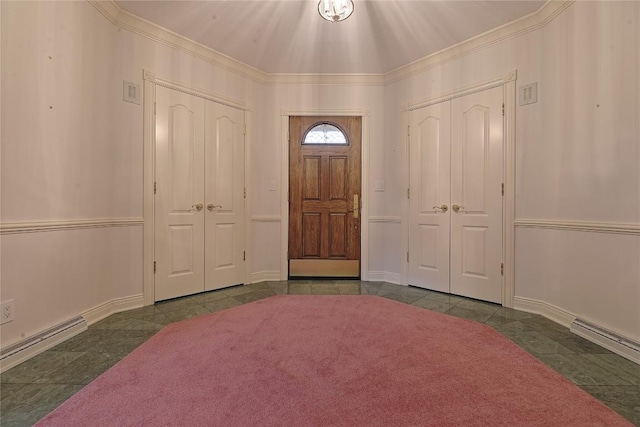 entryway featuring dark tile patterned flooring and a baseboard heating unit