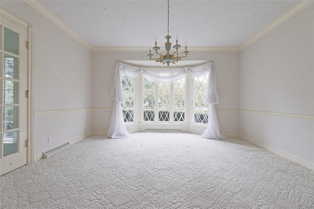 carpeted spare room featuring a baseboard heating unit, a notable chandelier, and ornamental molding