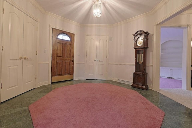 entryway featuring dark tile patterned flooring