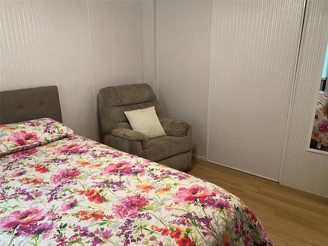 bedroom featuring hardwood / wood-style floors