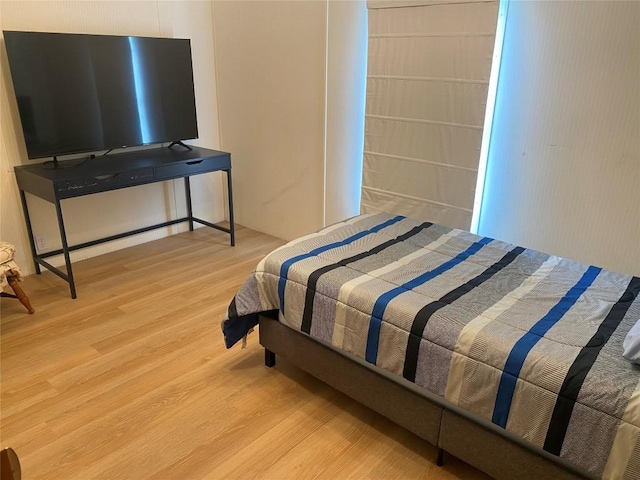 bedroom featuring light wood-type flooring