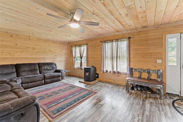 2629 River Dr, Jamestown, PA 16134 - living room with wooden ceiling, ceiling fan, wood walls, and wood-type flooring