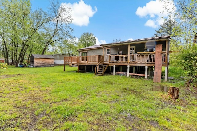 2629 River Dr, Jamestown, PA 16134 - back of house featuring a deck, a yard, and a shed