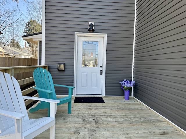 doorway to property with fence