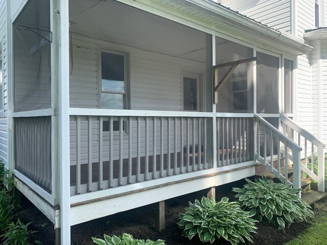 5511 Lake Rd, Atlantic, PA 16111 - view of home's exterior with a sunroom